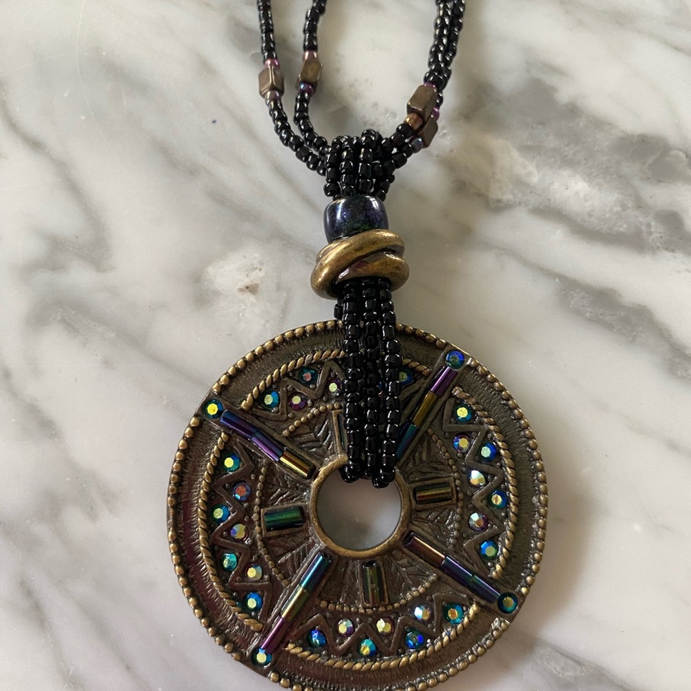 Intricate Black and Gold Pendant Necklace